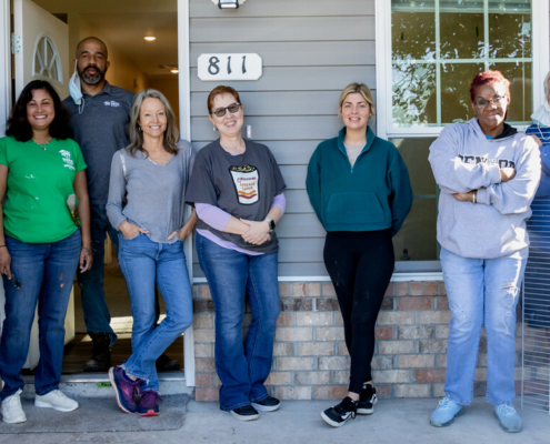 team of volunteers at a habijax house