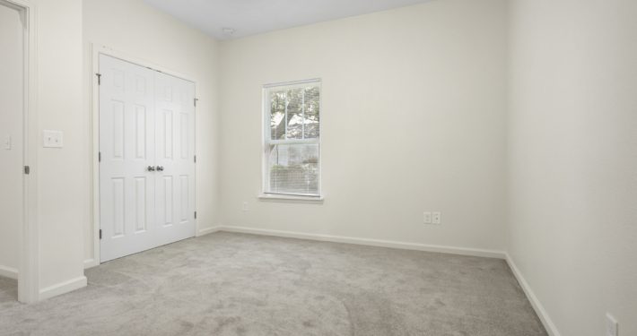 bedroom with closet doors