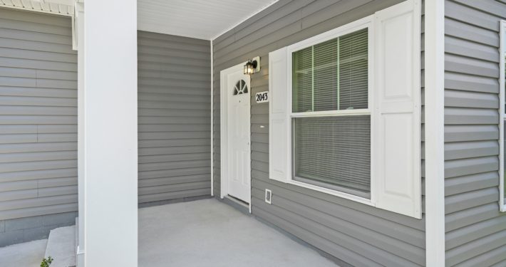 view of front door from the side of the house