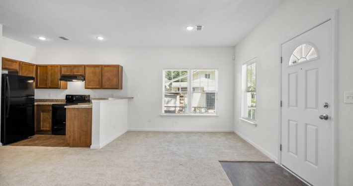 kitchen, living room, and front door