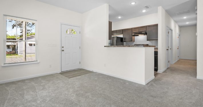 living room and partial kitchen