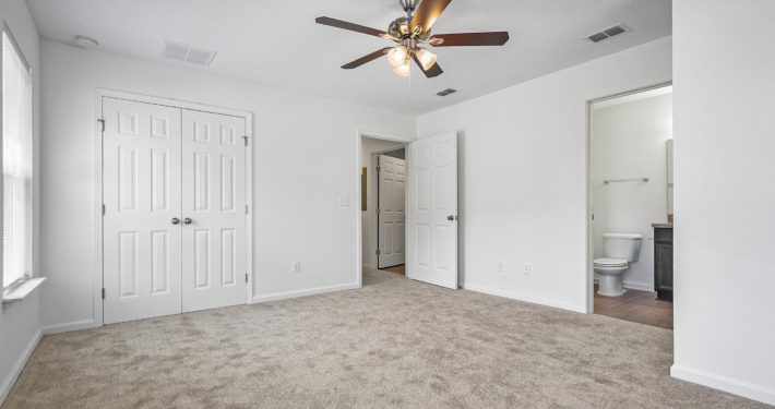 bedroom with bathroom inside it