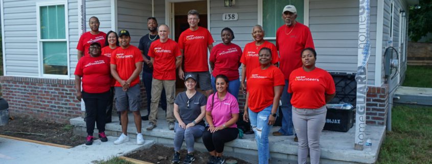 volunteers at a house