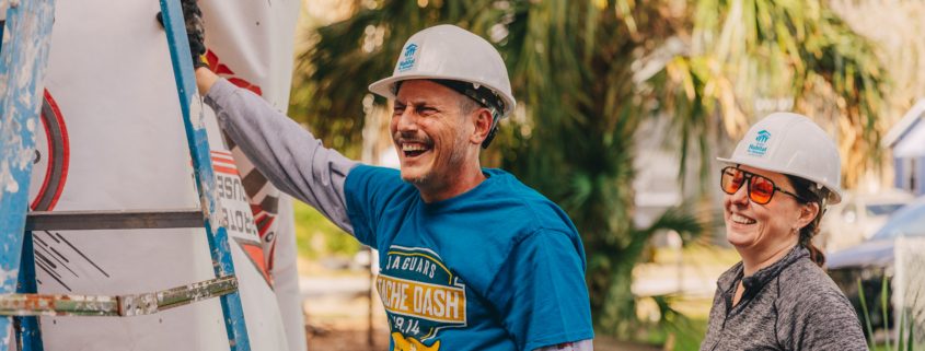 volunteers laughing together