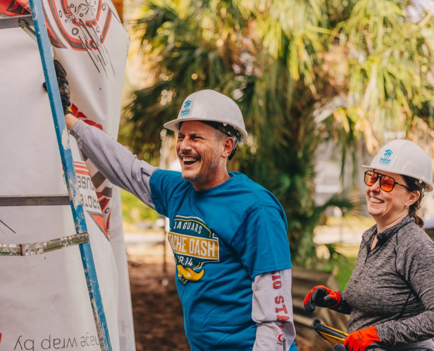 volunteers laughing together