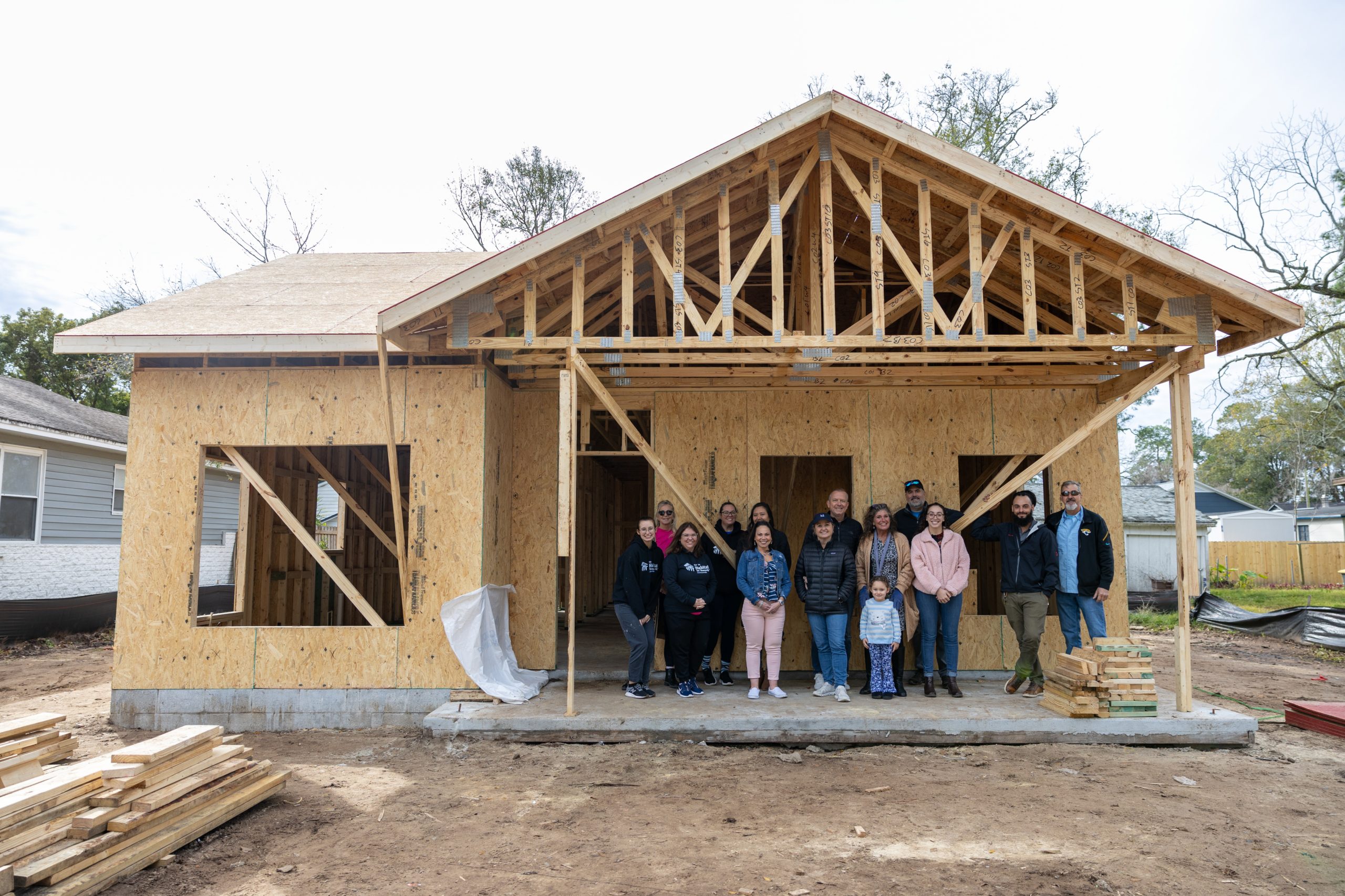 participants in front of the house