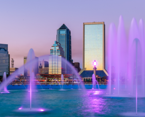 Downtown Jacksonville at dusk, from an illuminated fountain